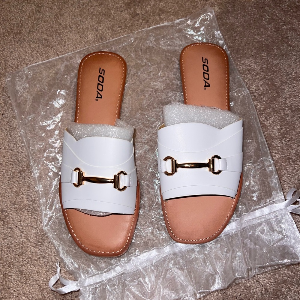 White flat sandals